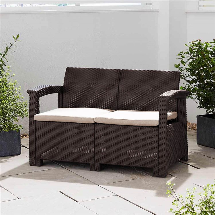 Click to view product details and reviews for Rattan Effect 2 Seater Sofa With Cushions Brown.